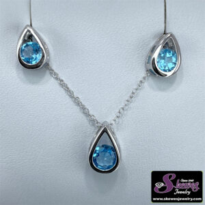 Elegant Sterling Silver Pearshaped Earrings and Pendant with Round Swiss Blue Topaz
