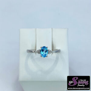 10K White Gold Blue Topaz and Diamond Accent Ring