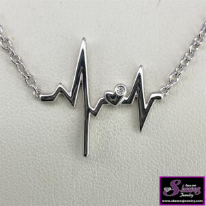 Dazzling Sterling Silver Heartbeat Pendant with Diamond Accent