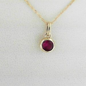 10K Yellow Gold 4mm Created Ruby Pendant
