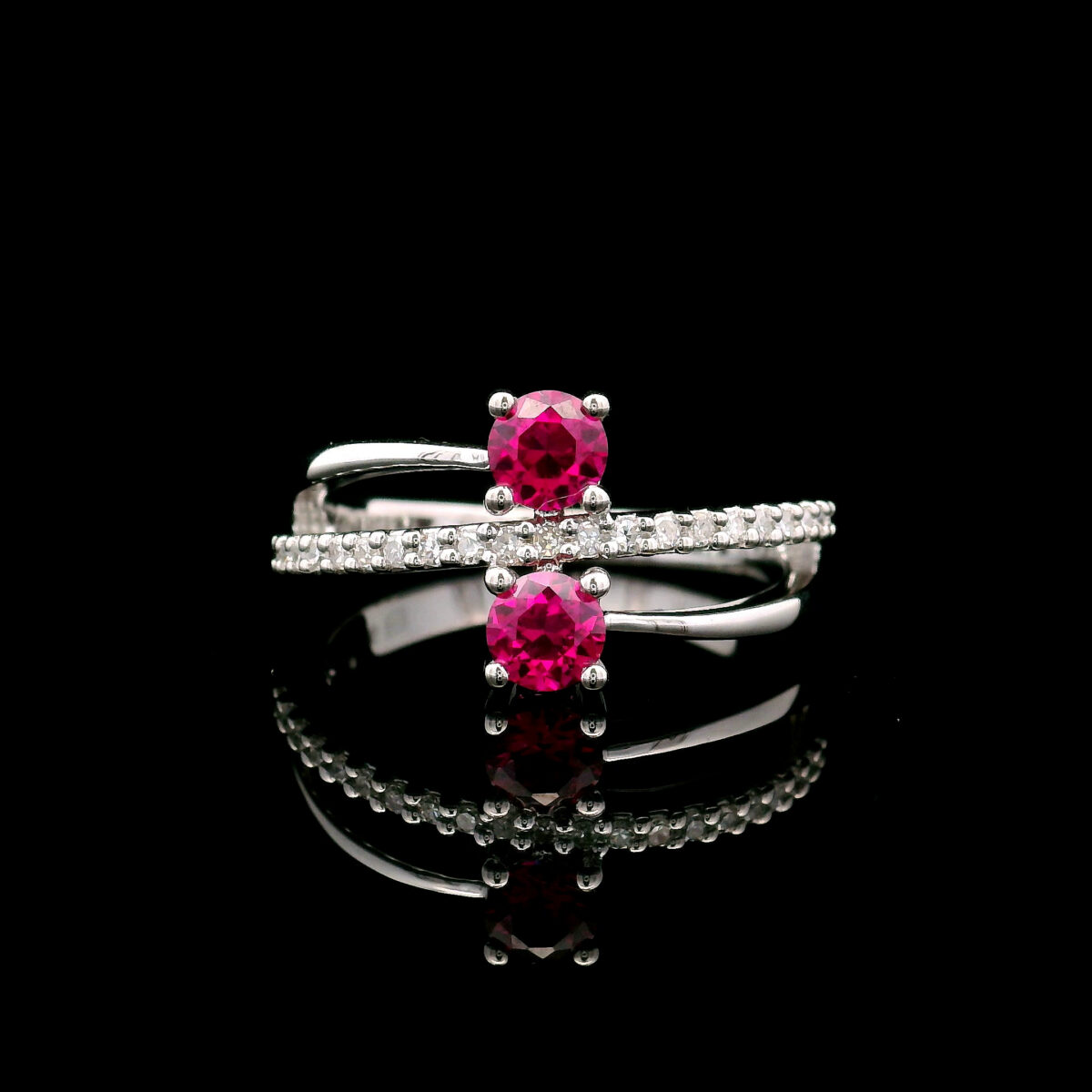 10K White Gold Two-Stone 4mm Created Ruby Crossover Ring w/ 0.125CTW Lab Grown Diamond Accents