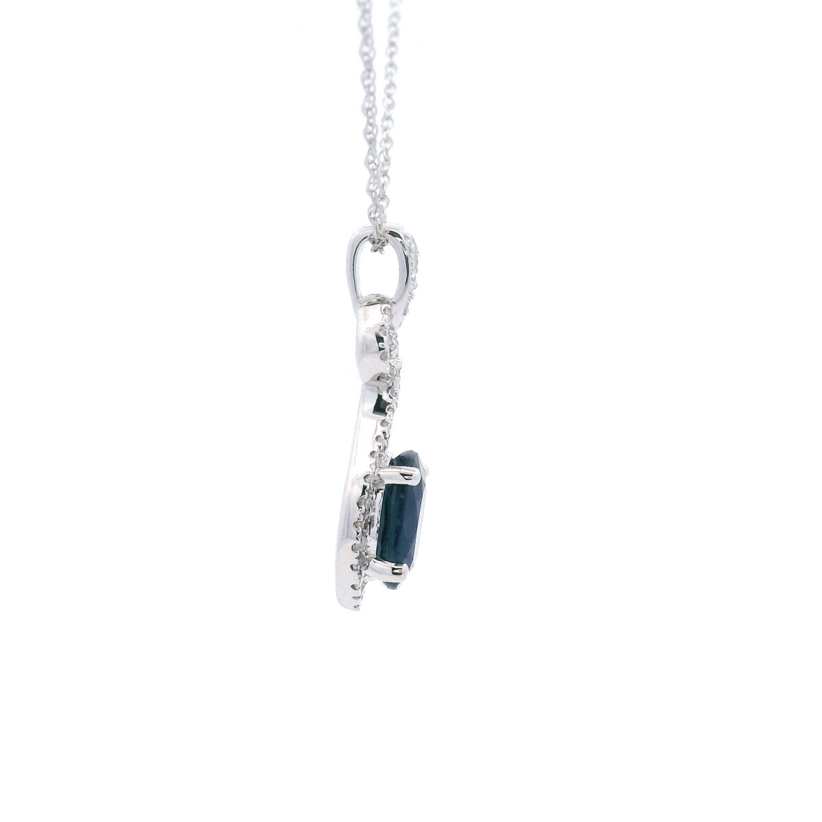 Elegant 10k white gold pendant with oval 7x5 blue sapphire and 1/6 diamond halo tw accents. - Image 4