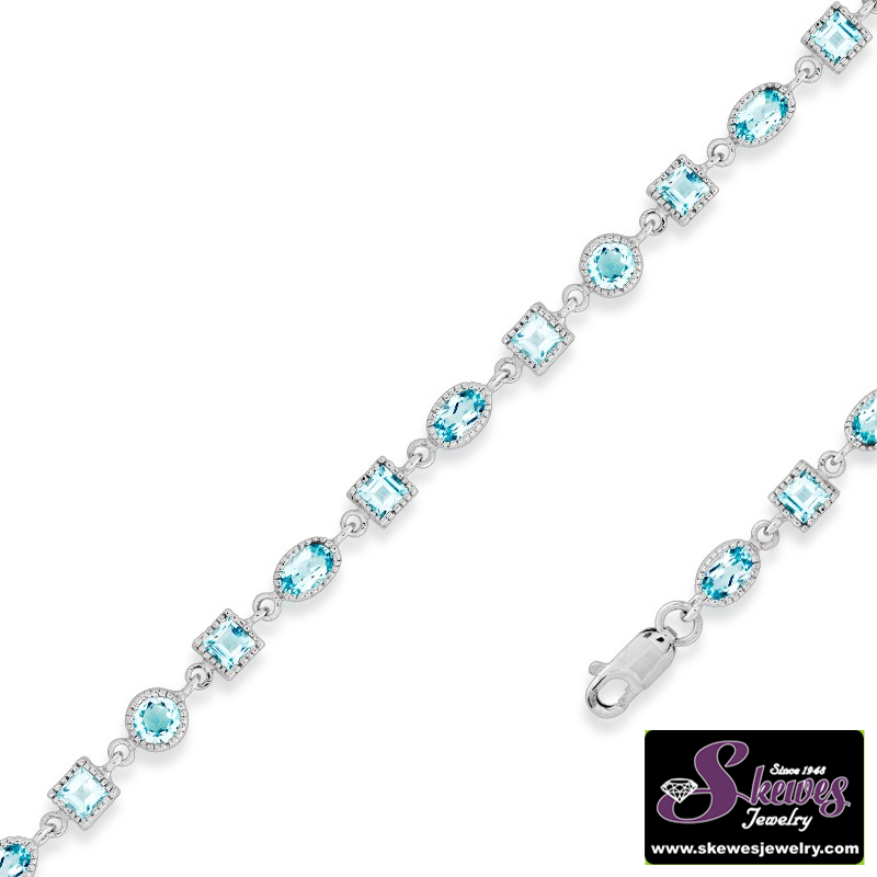 Elegant Sterling Silver Bracelet with Blue Topaz Gems