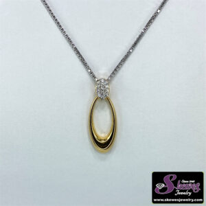 Elegant Sterling Silver and Yellow Gold Pendant with White Sapphire