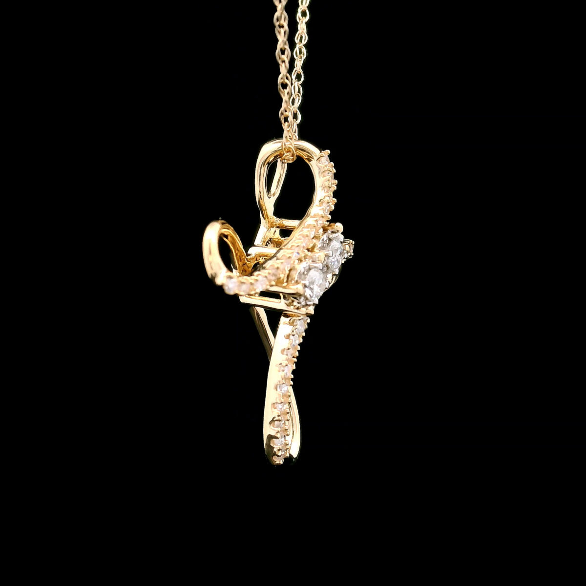Diamond Swirl Cross Pendant Necklace in 10k Yellow Gold with 32 = 0.14Twt Round Diamonds - Image 4